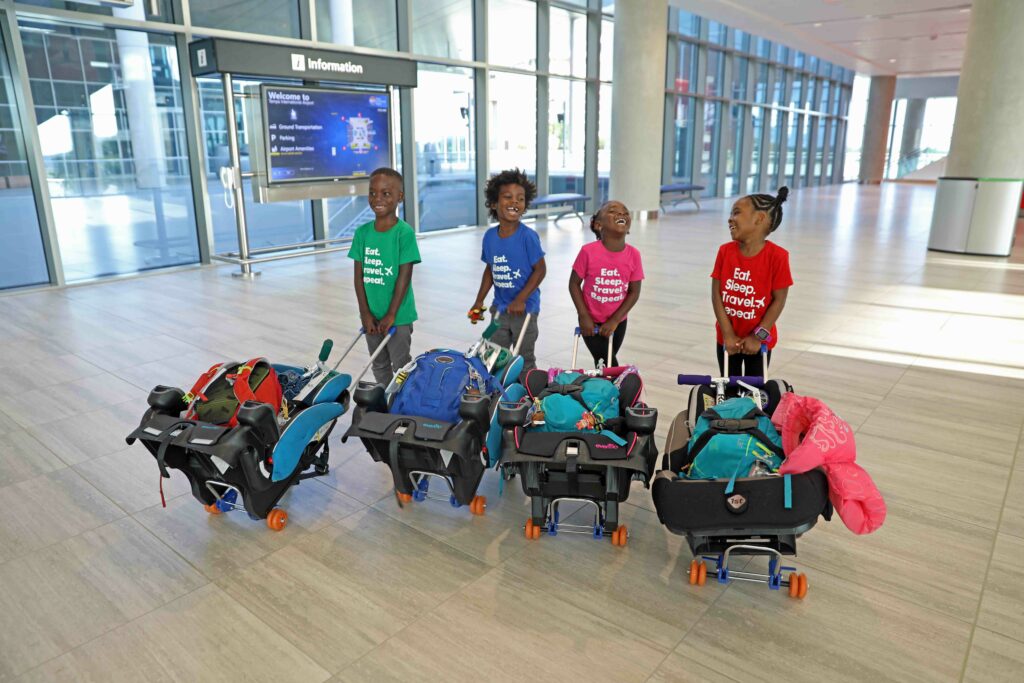 How To Carry A Car Seat Through The Airport (2024 Guide) – The Mom