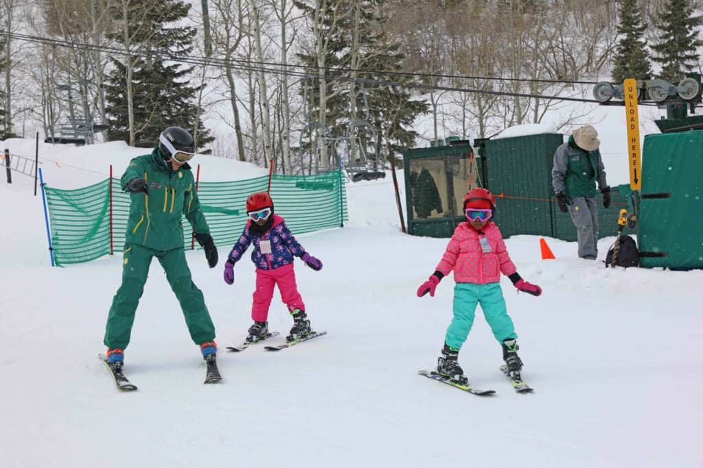 black children skiing at deer valey resort