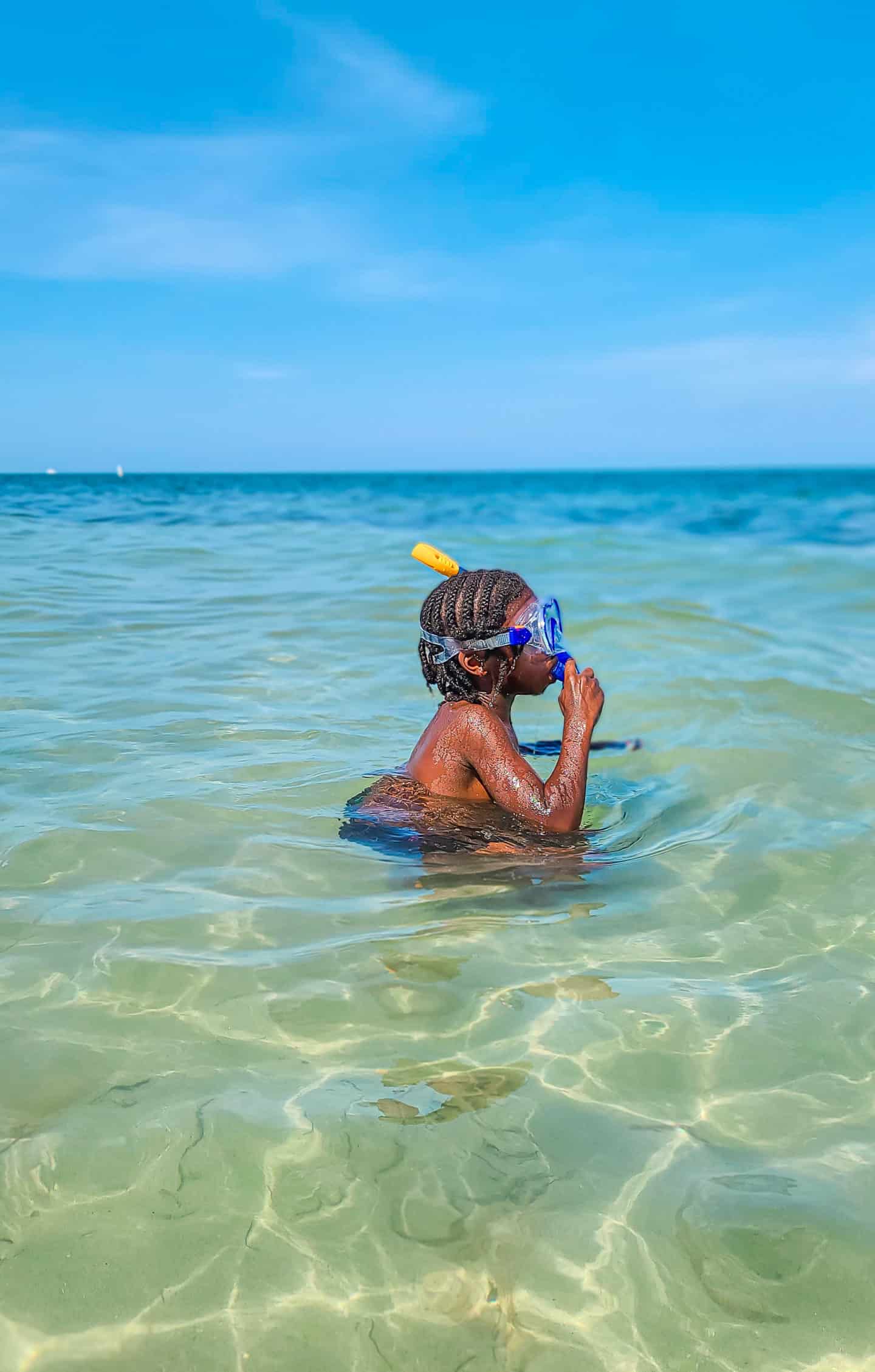 Child snorkeling at the beach