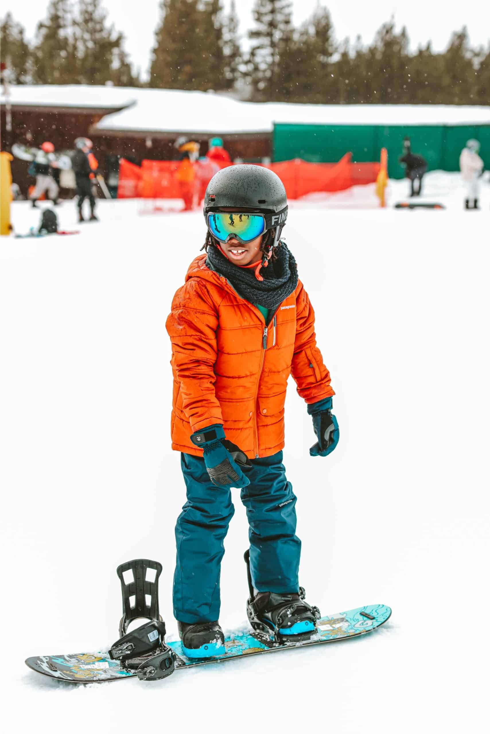 Heavenly snowboarding lesson for kids