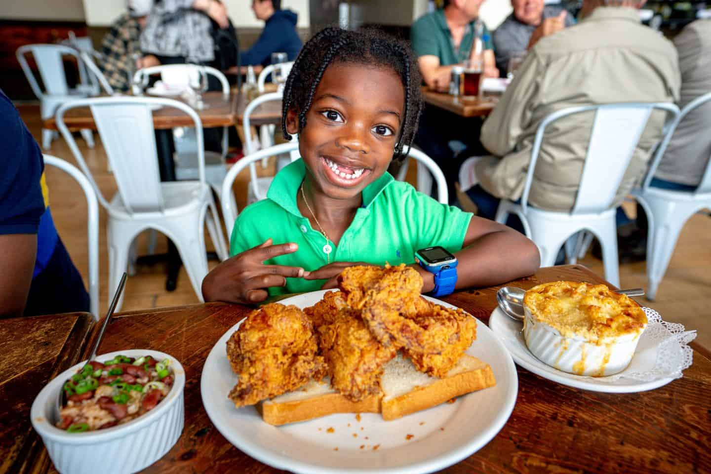 black kid eating friend chicken