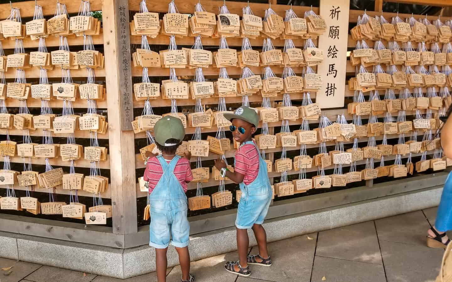 wooden wishing plaques in Japanese temple