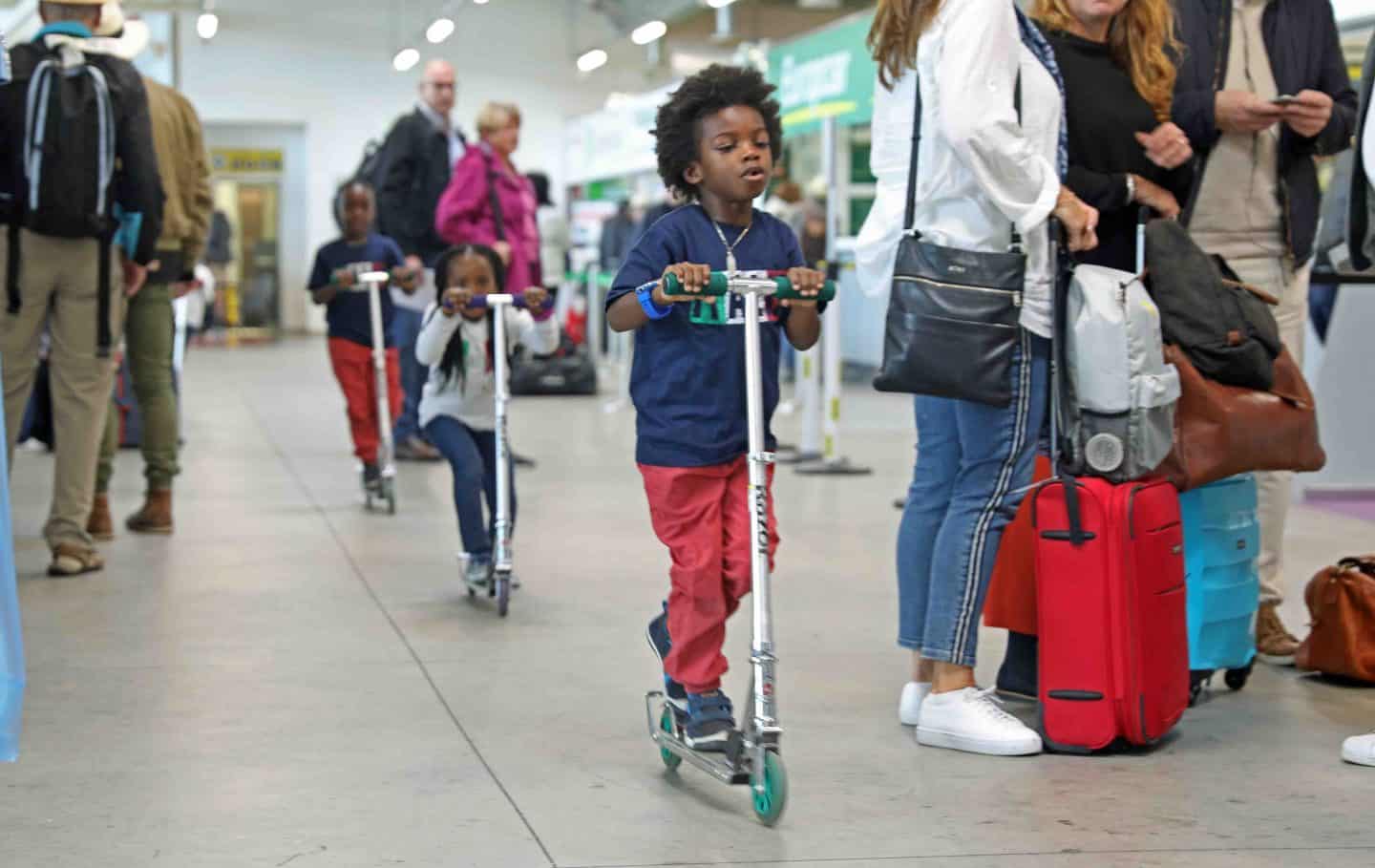 Black kids on scooter