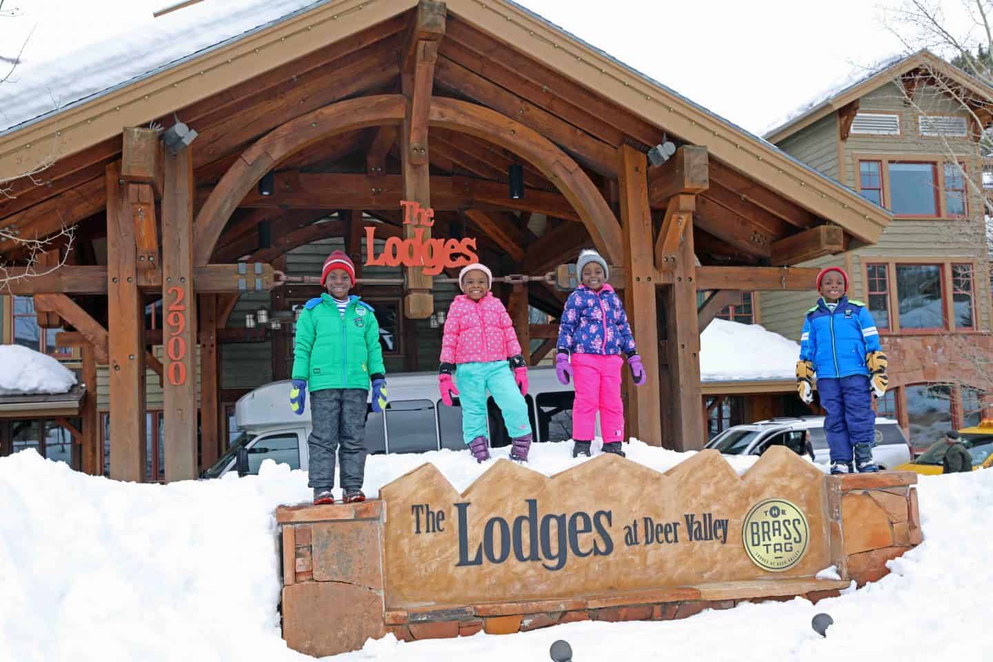 black kids standing in front of the lodges at deer valley
