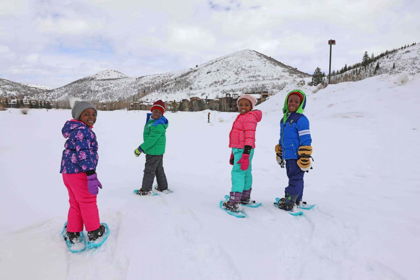 black kids travel and go snowshoeing