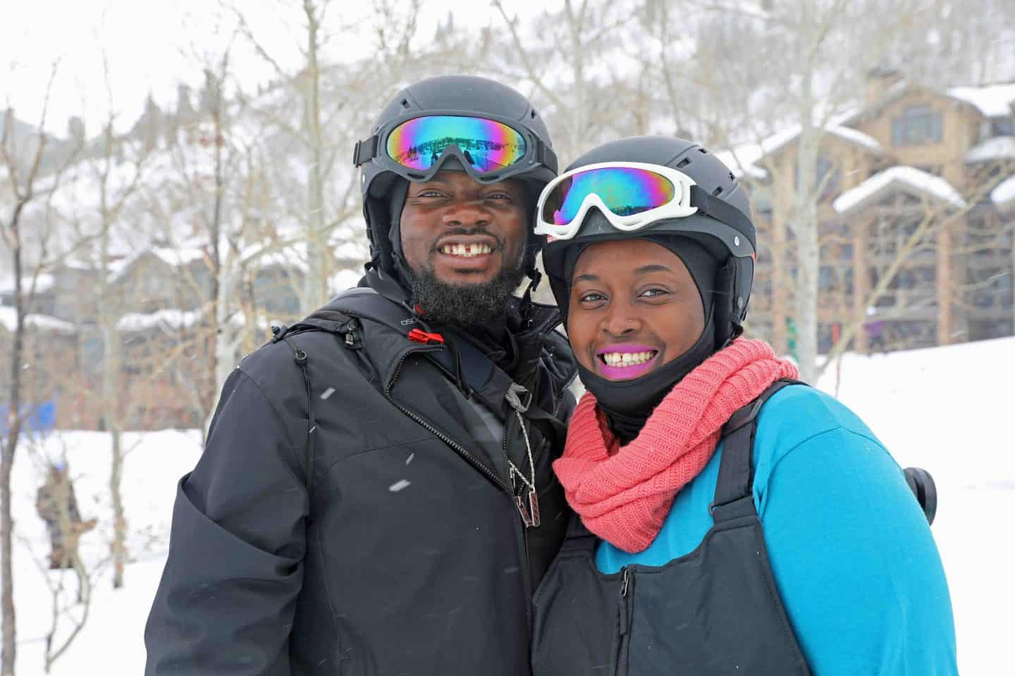 black man and woman in the snow