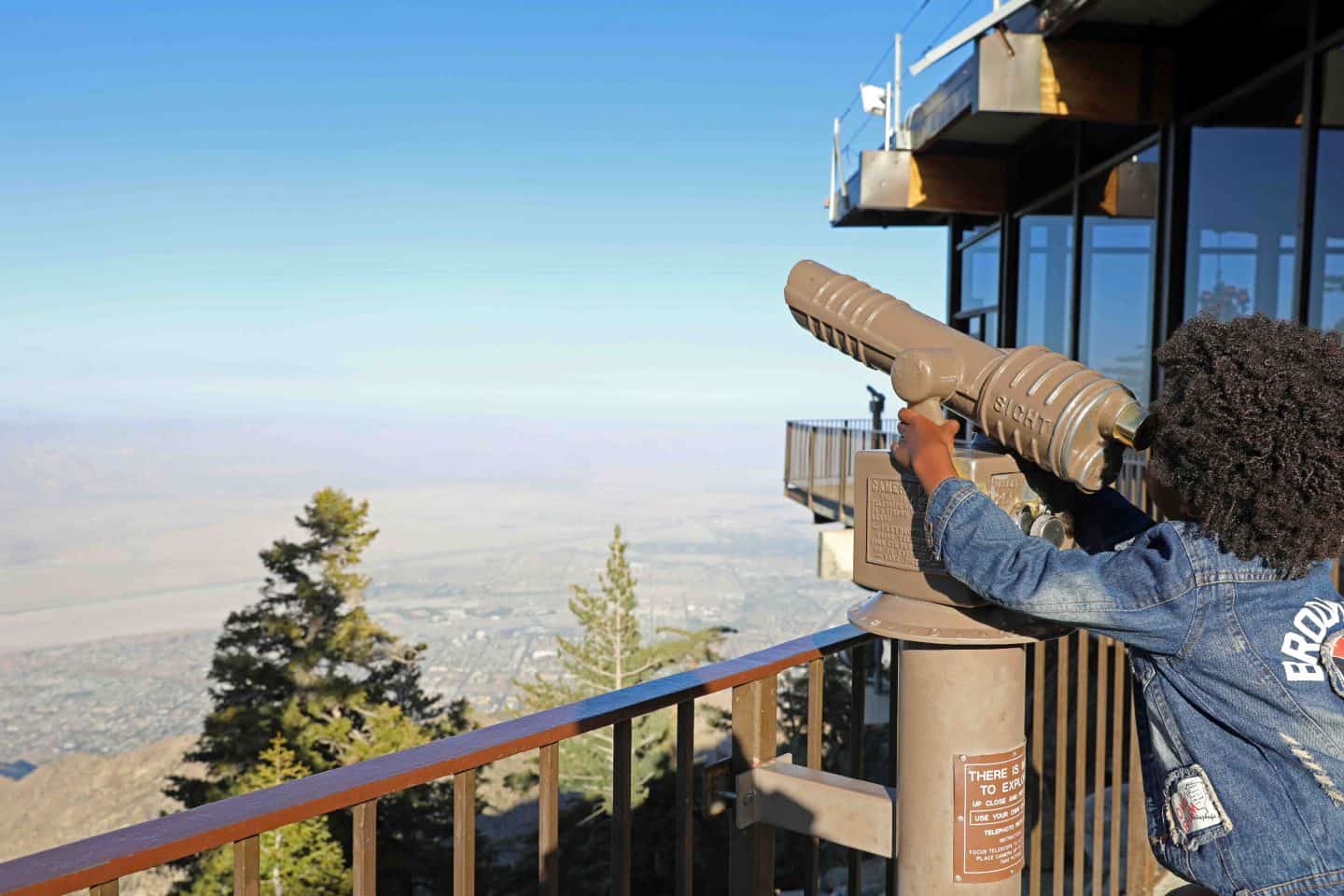 Viewing the distance through a telescope from the Palm Springs Aerial Tramway 