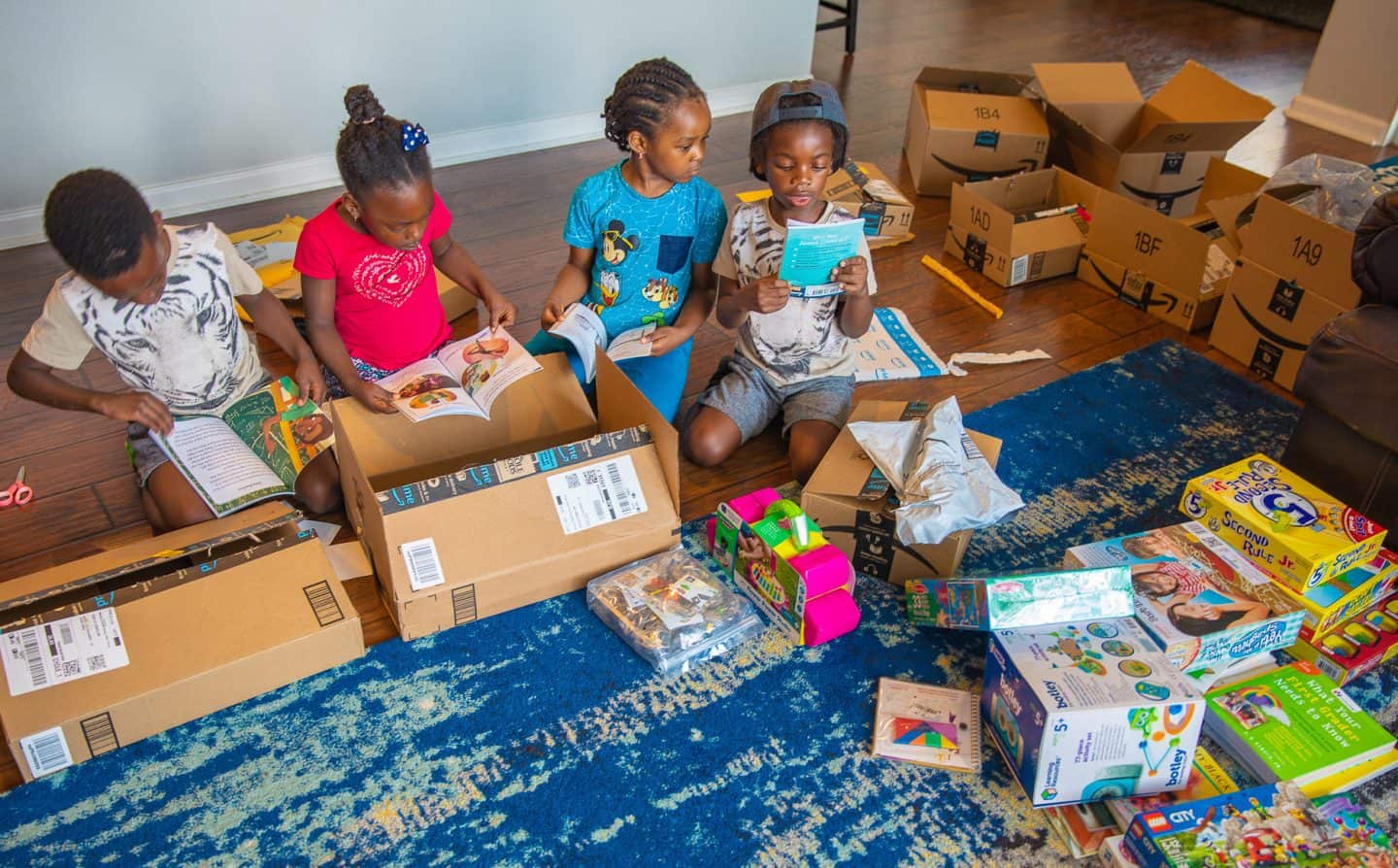 black kids opening boxes Subscription Boxes For Kids